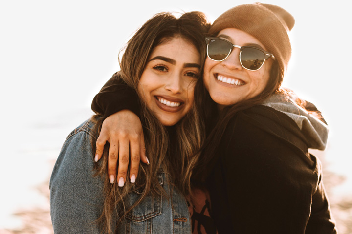 two women smiling